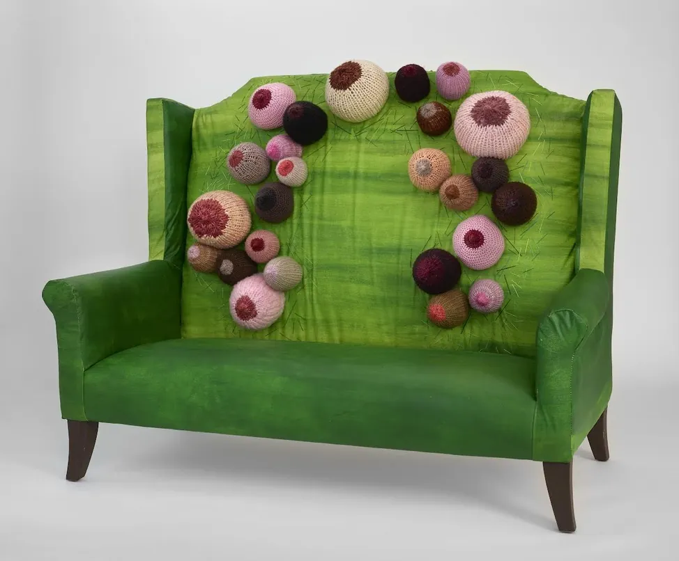 "A Throne of One's Own" 2022. Reupholstered with cotton canvas painted with acrylic paint and hand embroidered with hand-dyed merino yarn.