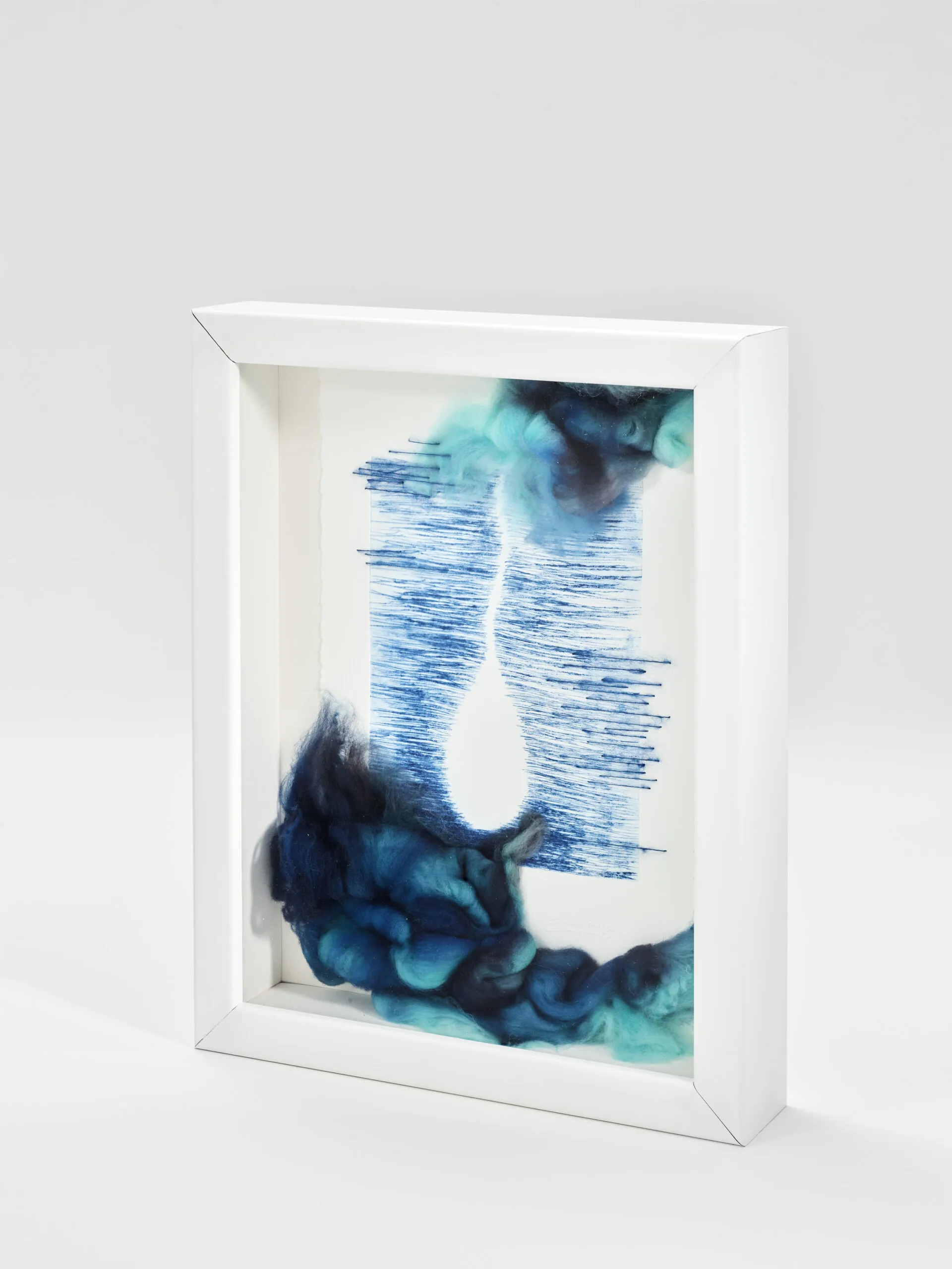 "Every Drop Counts, Edition II". 2025. 14" x 12" x 3" Each. Manually altered etching on paper, wool roving and stitching in acrylic shadow box.