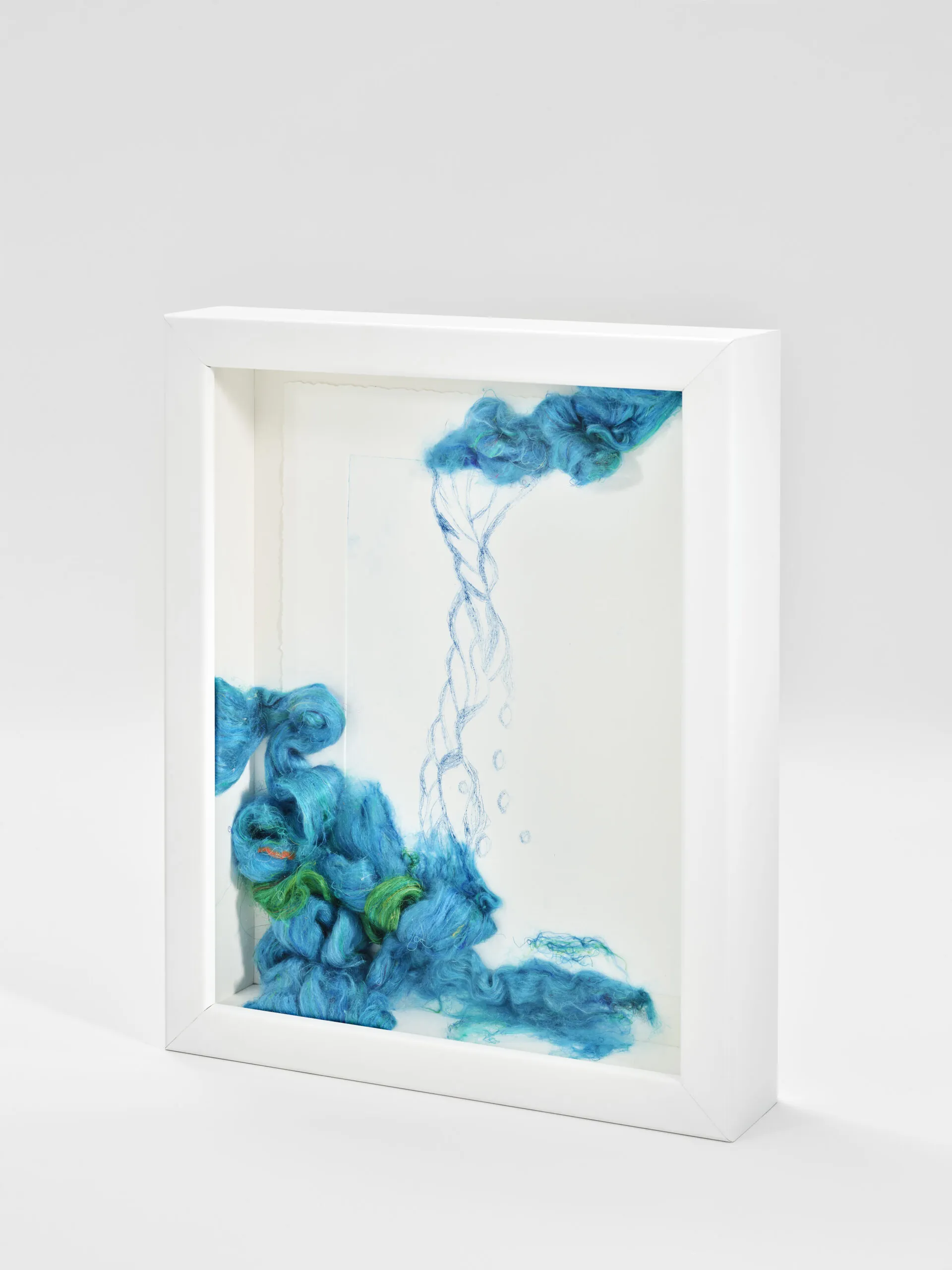 "Every Drop Counts, Edition I". 2025. 14" x 12" x 3" Each. Manually altered etching on paper, wool roving and stitching in acrylic shadow box.