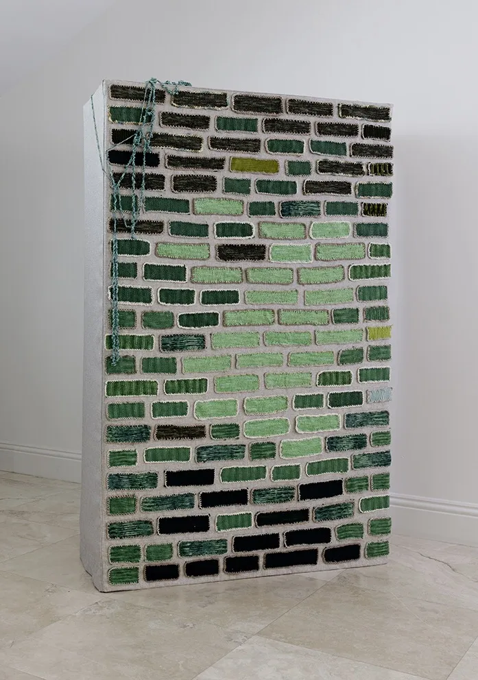 "Fiber Wall. A Ray of Light" 2019. 6’ 3” x 4’ x 1’ 6”. Hand knit bricks applied to metal wire mesh.