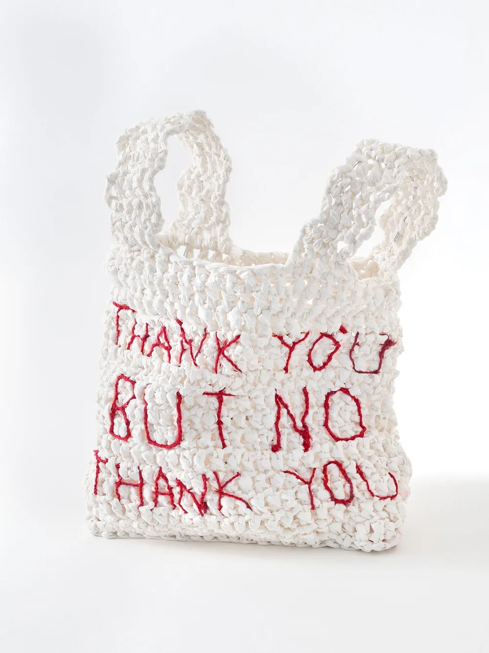 Hand crocheted with plastic yarn. Embroidered with cotton thread. 2020.