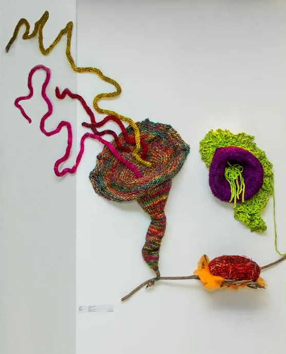 Hand dyed wool and other natural fibers. Wires.