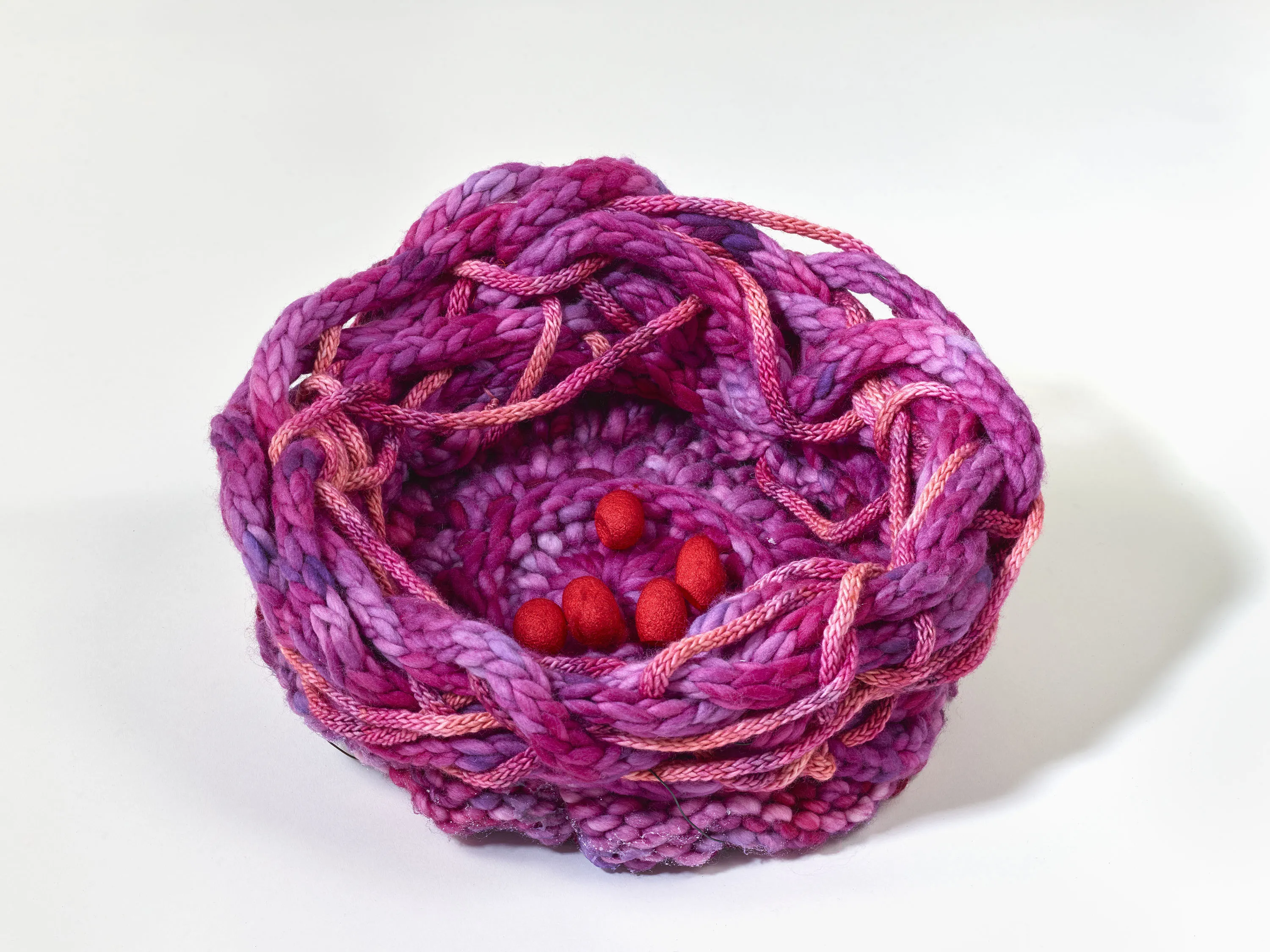 “Nesting” 2017 12” x 12” Hand Knit with kettle dye merino yarn.
